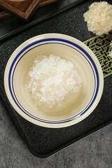 White Snow Fungus Tremella Mushroom in Blue Rim Bowl Ready for Cooking
