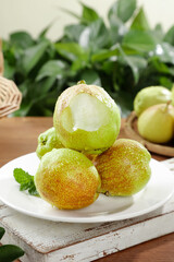 Fresh Korla Pears from Xinjiang China - Whole Fragrant Crisp Asian Fruit on White Plate
