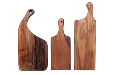 Three rustic wooden cutting boards with unique organic shapes and natural wood grain displayed against a solid Transparent PNG background