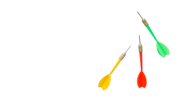 Three colorful darts yellow red and green poised for flight against a stark Transparent PNG background in a dynamic composition