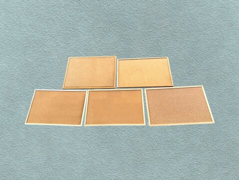 The green background in the image is a brown sticky whiteboard with sturdy edges, used for hanging or placing pins to show work on the board from soft brown wood, soft wood texture Beautiful.