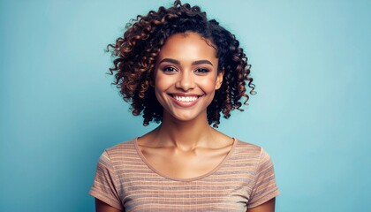 Portrait of a young woman in stylish casual, happily smiling against an isolated color background with copy space.