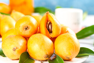 Fresh Loquat Fruits from Yunnan China Alpine Region with Green Leaves