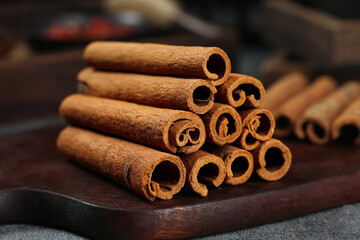Natural Cinnamon Sticks from Guangxi China - Aromatic Spice Seasoning on Wooden Board