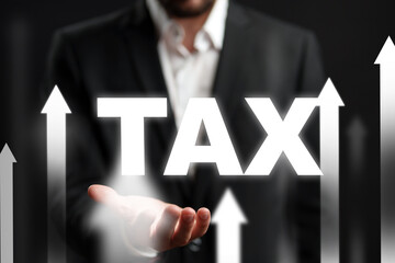 Graphic showing increasing taxi demand with business person holding the word taxi