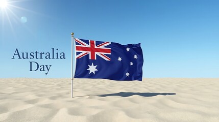 Australia day text with australian flag on sand under clear blue sky