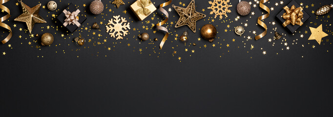 Holiday decoration black background with gift boxes and christmas ornament