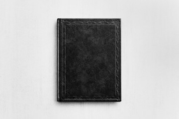 mock up book black color on light gray background close-up, top view