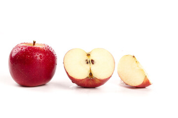 Fresh Red Apples Cut and Displayed on White Background