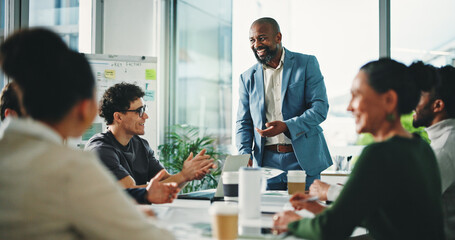 Man, presentation and applause at office meeting, team and success with support at finance company. Person, speaker and paperwork with group, motivation and achievement with goal at investment agency