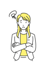 オフィスカジュアルの女性 困った表情（イエローアクセント）