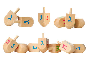 Set, Wooden dreidels in varied positions with colors, isolated, PNG