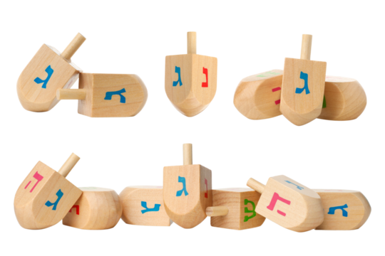 Set, Wooden dreidels in varied positions with colors, isolated, PNG