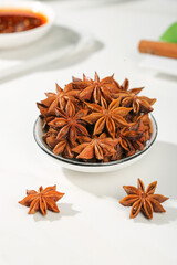 Star Anise Spices in Bowl - Dried Aromatic Seasoning for Cooking