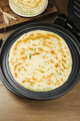 Handmade Scallion Pancakes Fried in Pan - Traditional Asian Flatbread Cooking Show Pictures