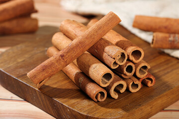 Natural Cinnamon Sticks from Guangxi Fujian Provinces Aromatic Spice Seasoning on Wooden Board