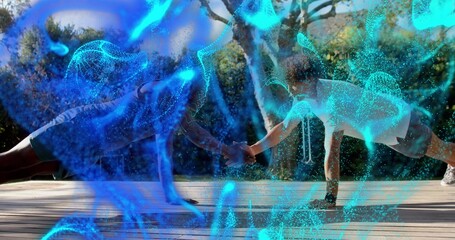 Doing partnered plank, pair in tank tops clasping hands on wooden backyard deck, blue overlay