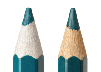 Two turquoise pencils, tips sharpened. Close up view.