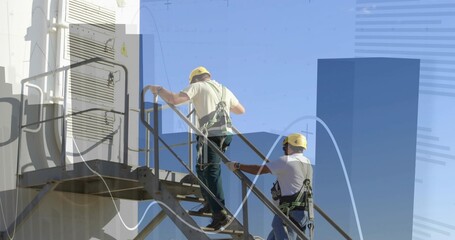 Climbing pair wearing yellow helmets and harness on roof metal stairs by cabinet with graph overlay