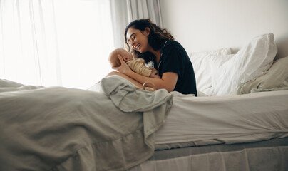 Mother bonding with her baby