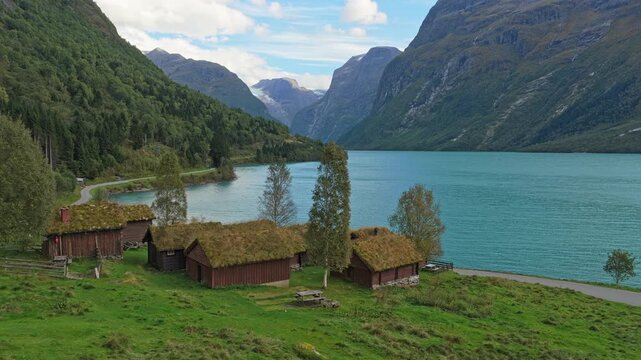 Lovatnet lake and Breng seter huts seen from above in daylight, Norway