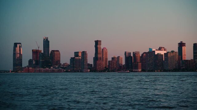 Jersey City Skyline at Sunset Across the Hudson River &mdash; Cinematic Urban Waterfront View