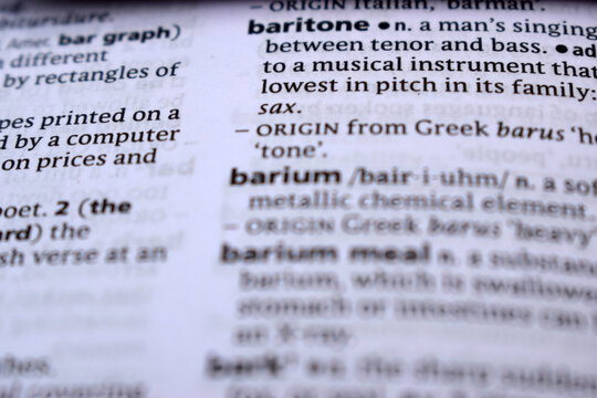 Close Up Of English Dictionary Page With Word - baritone