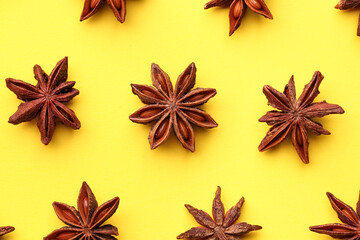 Composition with aromatic star anise spice on yellow background