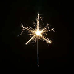 Obraz premium Sparkler burning brightly against black background