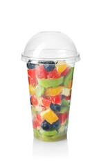 Tasty fruit salad in plastic cup isolated on white. Healthy snack