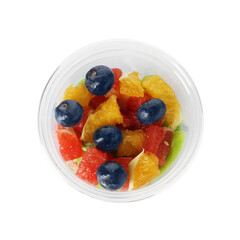 Tasty fruit salad in plastic cup isolated on white, top view. Healthy snack