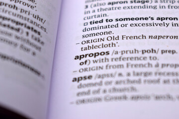 Obraz premium English Definition Dictionary Page Close Up Of Printed Word Of -apropos