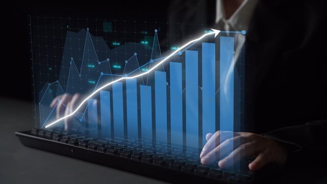 A professional setting showcases a digital graph overlaying a keyboard, illustrating business growth and financial success through modern data analysis techniques. Copula - Powered by Adobe