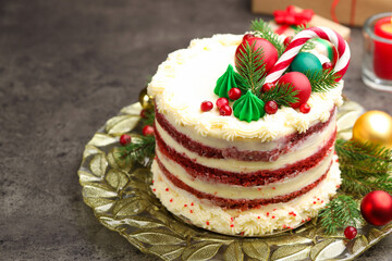 Tasty cake with Christmas decor on grey table, closeup. Space for text