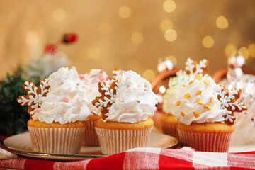 Festive cupcakes with cookies on table, closeup. Christmas treat
