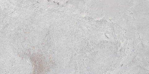 The rough surface of a stone slab with a concrete hue. Design for porcelain tiles