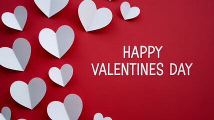 Happy valentines day greeting card with white paper hearts on a red background for love celebration