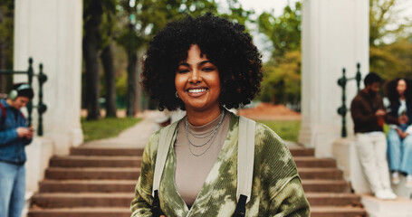 College student, girl or smile in portrait on campus for study break, learning opportunity or...