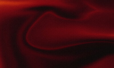 Flowing red silk and satin fabric texture abstract background with soft waves and luxurious curves