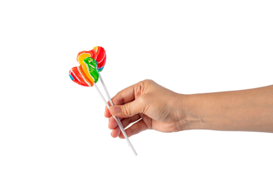 Sweets, lollipops in hand, on transparent background