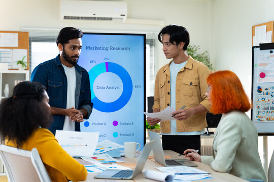 Group of Multiracial creative business brain storm meeting presentation,discussing roadmap to product launch, planning,strategy,new business development,working with new startup project in office.