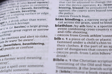 Obraz premium Close Up Of English Dictionary Page With Word - bias binding