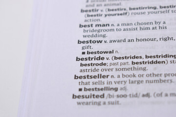 Close Up Of English Dictionary Page With Word - bestride