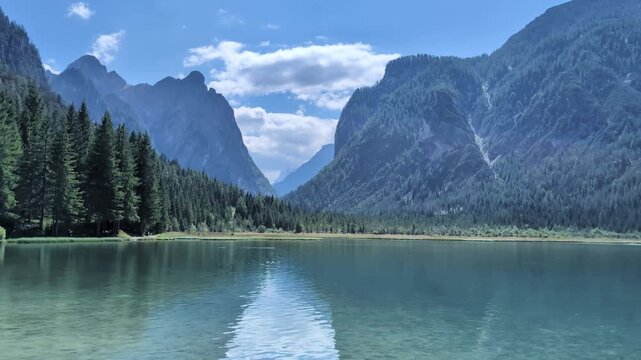 Toblach lake in Italian Dolomites, peaceful mountain lake ambience