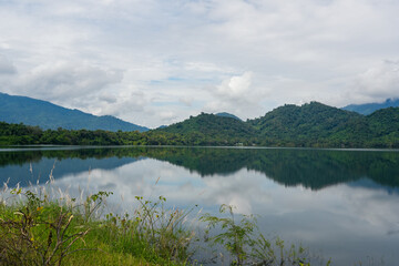Fototapeta premium nice view of refection on the water with great view of mountain in the day of blue sky