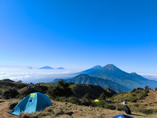 Sunrise camp location on top of Mount Prau, Wonosobo, Indonesia with stunning views.
