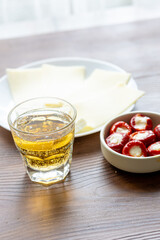 Close-Up of White Wine and Cheese Plate	