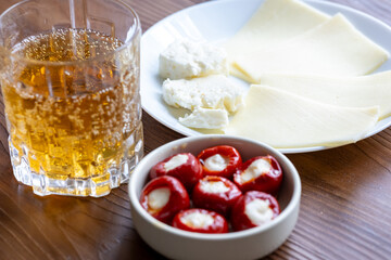 Close-Up of White Wine and Cheese Plate
