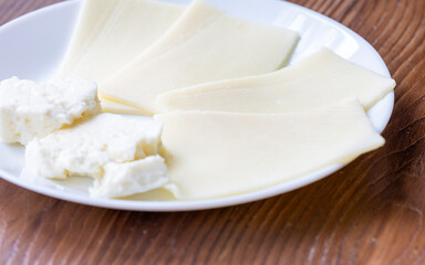 Close-Up of European Cheeses on Plate
