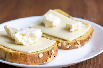 Close-Up of European Cheeses on Bread